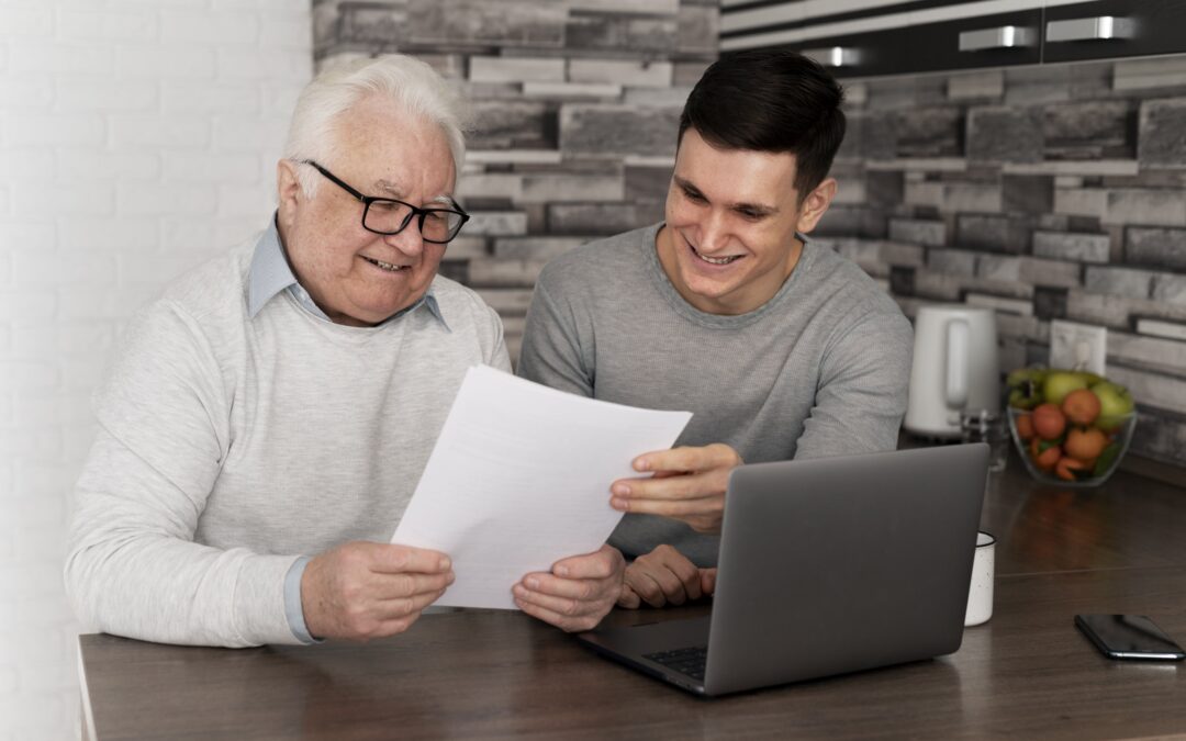 An older man discussing with a young man