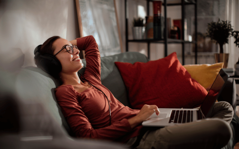 A girl relaxing on the sofa at home.