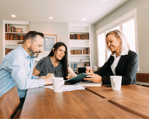 Young couple taking advice from an accountant.