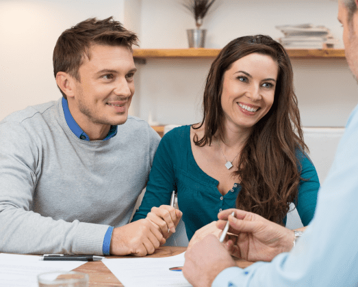 Young couple taking advice from an accountant.