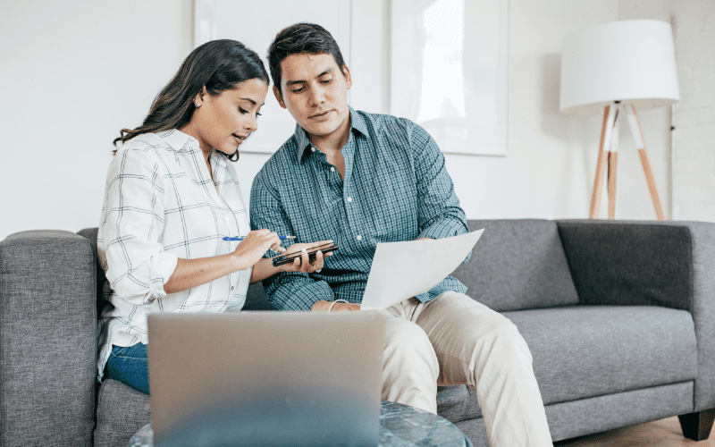 A girl is discussing finance with a boy.