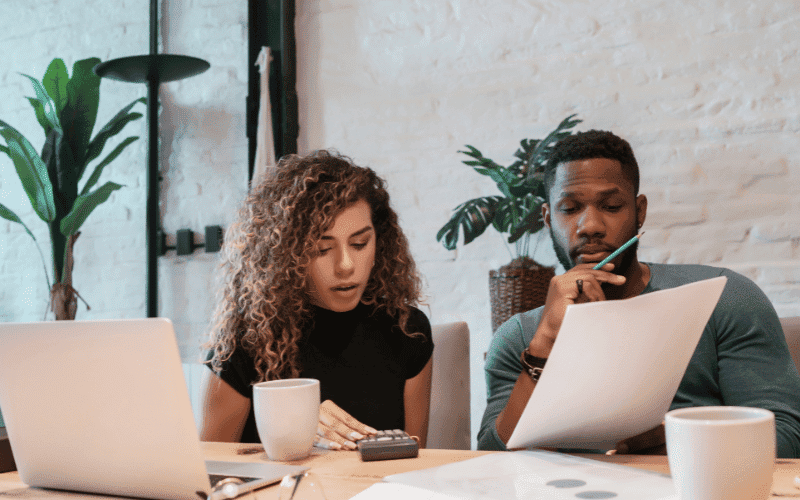 A girl discussing finance with a boy.